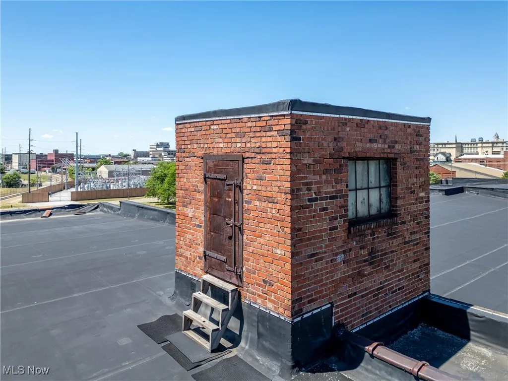 View of outbuilding roof access area