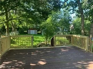Wooden terrace with a shed