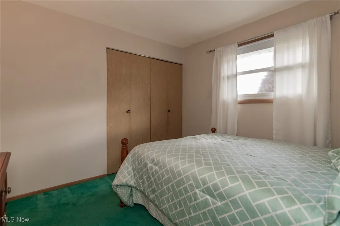 Another view of the second bedroom with closet!