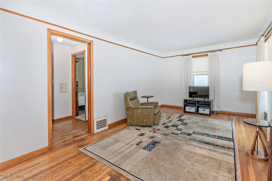 Living area with light wood-style flooring