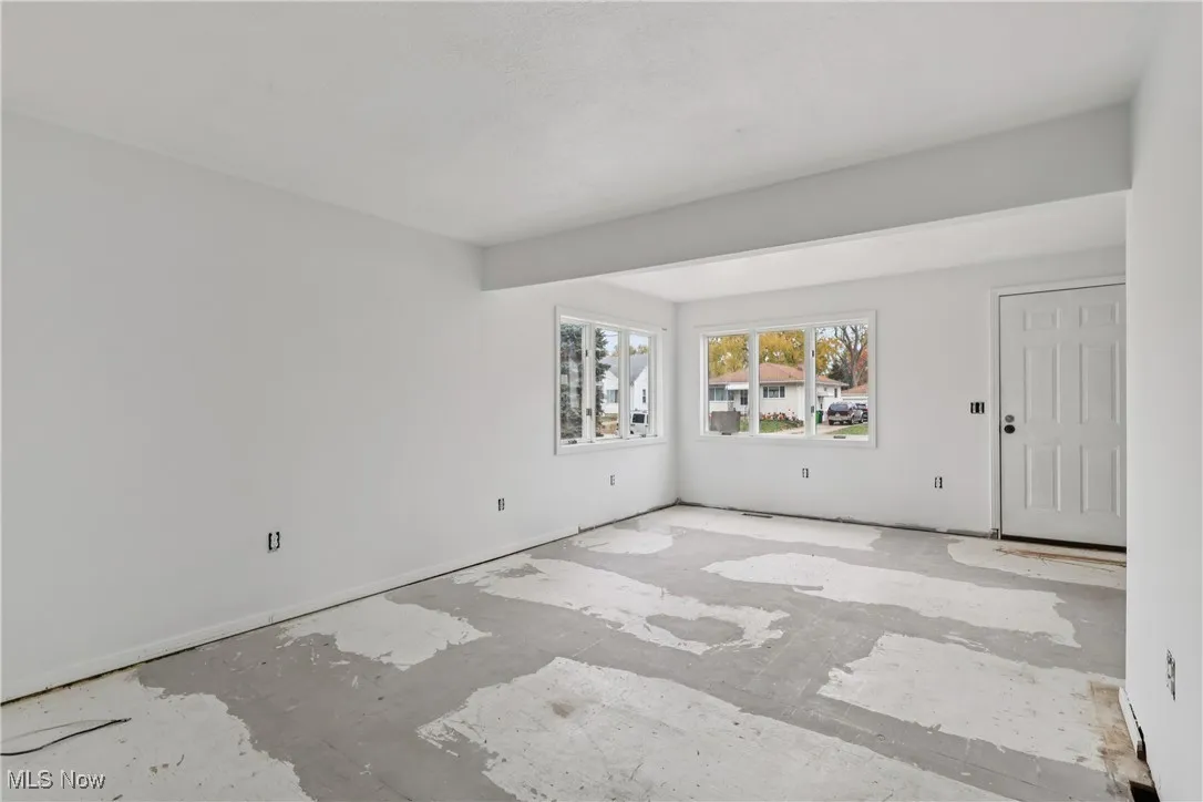 Living room showing front door entrance