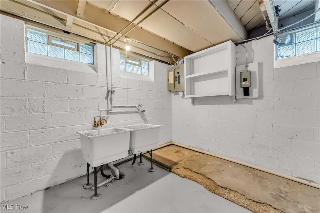 Basement featuring electric panel