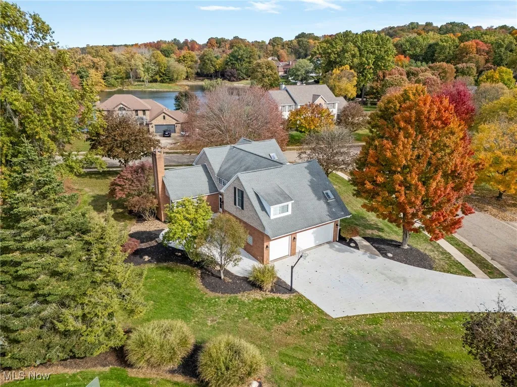 View from above of property with a large body of water