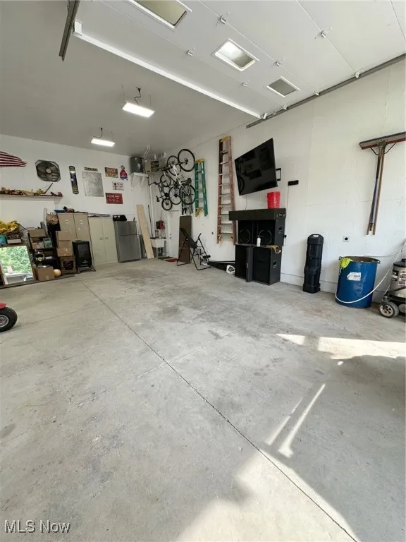 Detached, heated garage with water.  Built in 2022.