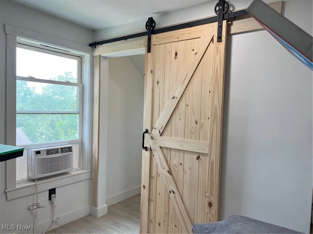 Sliding barn door for half bathroom.