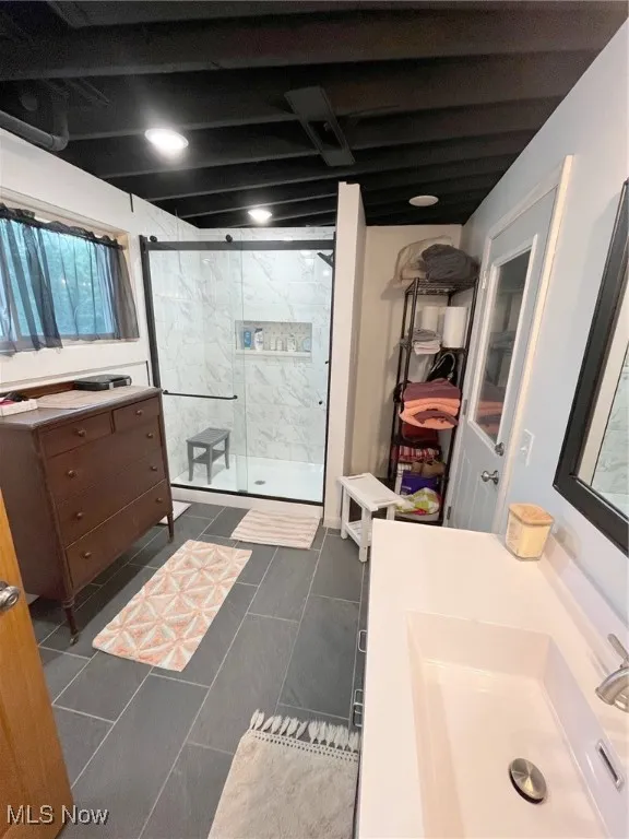 Newer full bath in lower level.