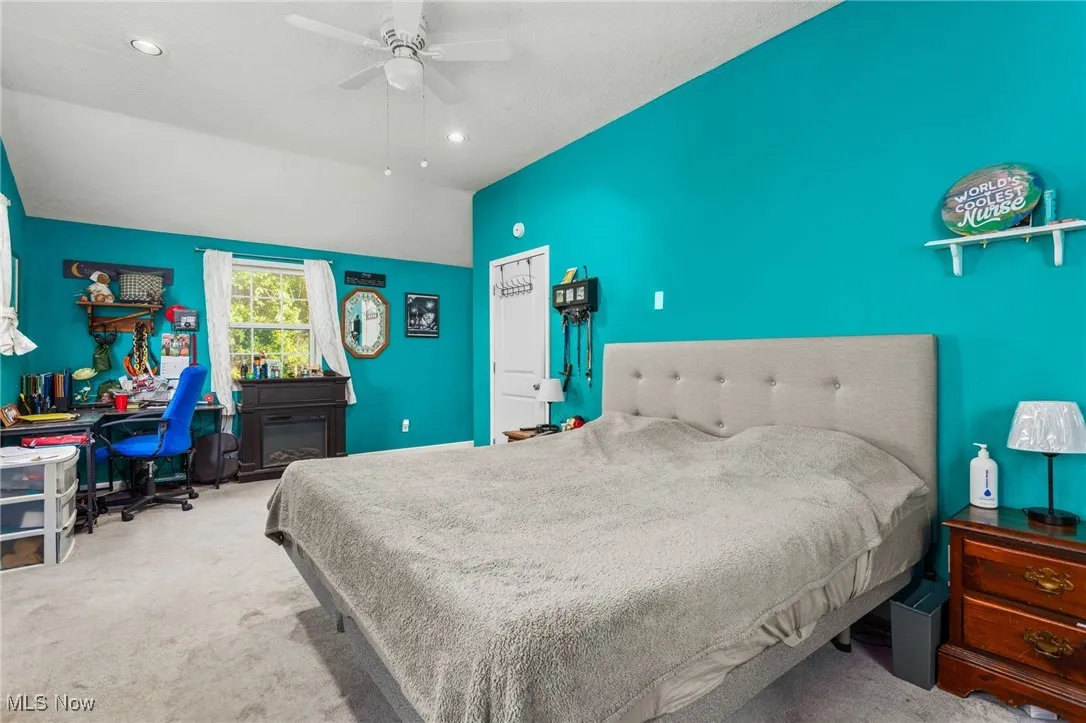 Bedroom featuring a ceiling fan, and recessed lighting