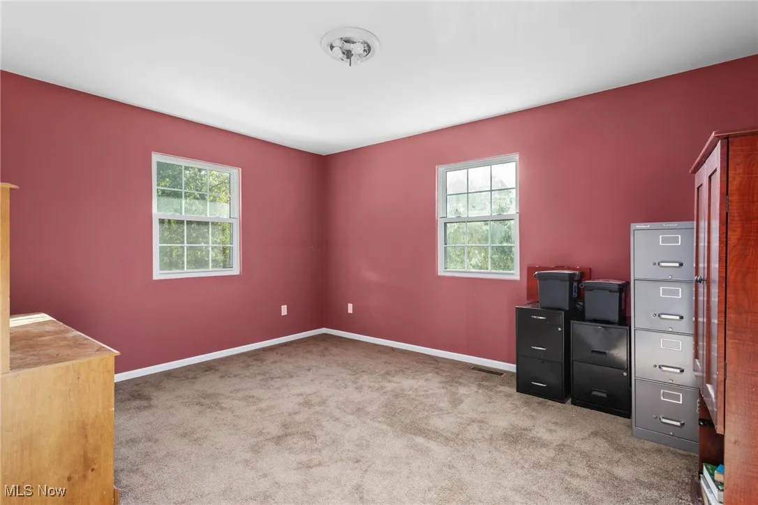 Bedroom with carpet floors and nice views