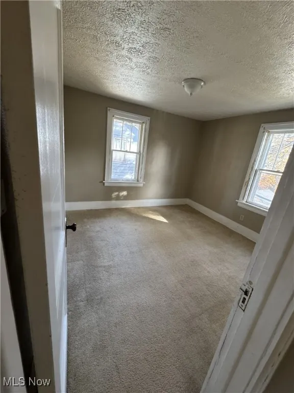 100 Victor Avenue Cuyahoga Falls Ohio 44221 is a two bedroom and one bath rental home with an unfinished but clean & painted basement with glass block windows. Bright with natural light this property has an awesome front porch, its own driveway for offstreet parking, 2 bedrooms and bath upstairs with Living Room, Dining Room and Kitchen on the 1st floor. Don't miss this awesome rental in the Falls! Call your favorite real estate professional or the listing Agent for a private tour!