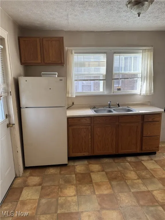 100 Victor Avenue Cuyahoga Falls Ohio 44221 is a two bedroom and one bath rental home with an unfinished but clean & painted basement with glass block windows. Bright with natural light this property has an awesome front porch, its own driveway for offstreet parking, 2 bedrooms and bath upstairs with Living Room, Dining Room and Kitchen on the 1st floor. Don't miss this awesome rental in the Falls! Call your favorite real estate professional or the listing Agent for a private tour!