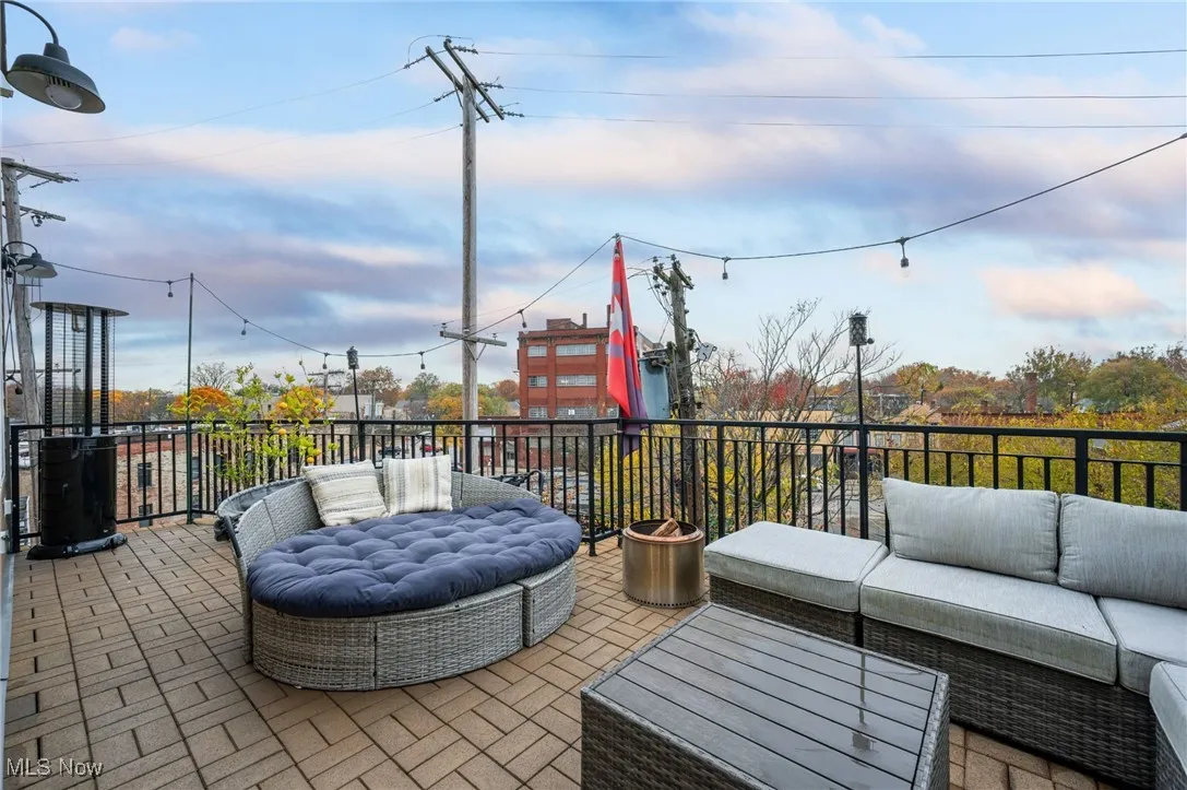 Wooden deck featuring outdoor lounge area and a patio