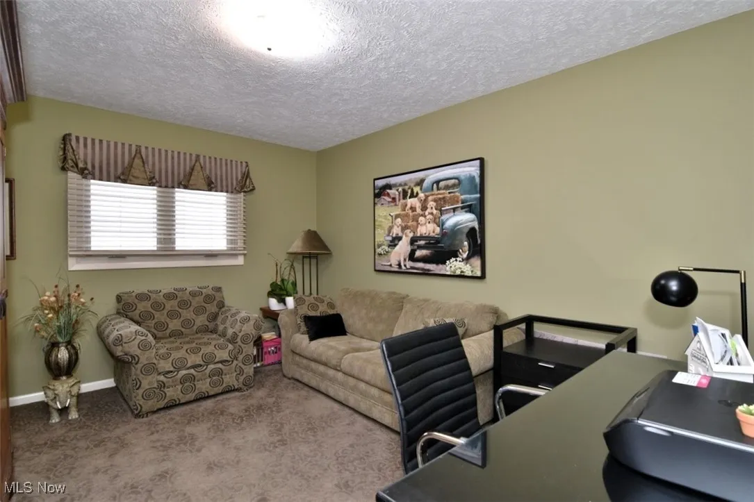 Bedroom, den or office next to a full bathroom on main level