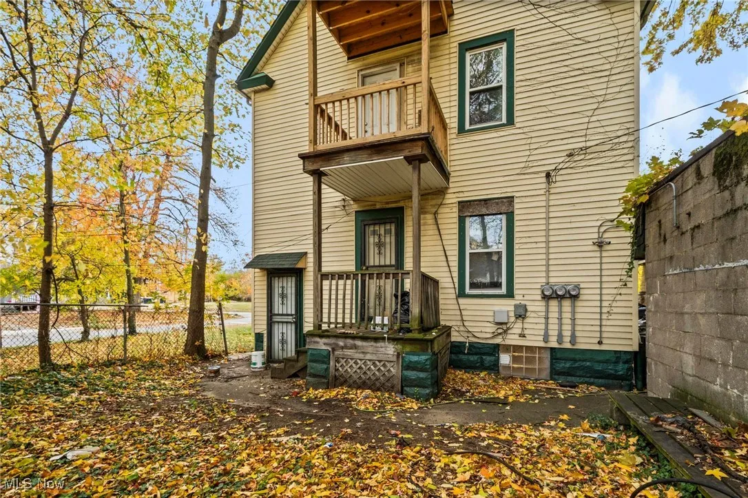Rear view of house featuring a balcony