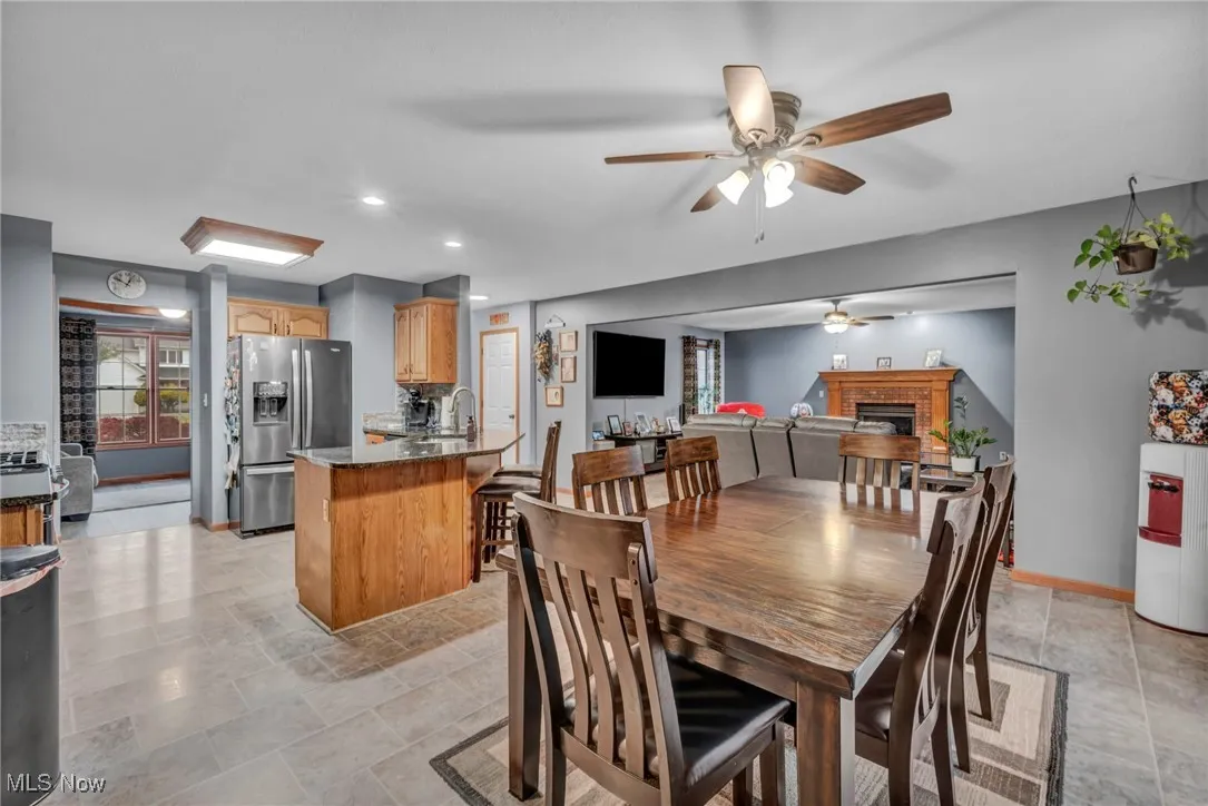 Dining area with a ceiling fan