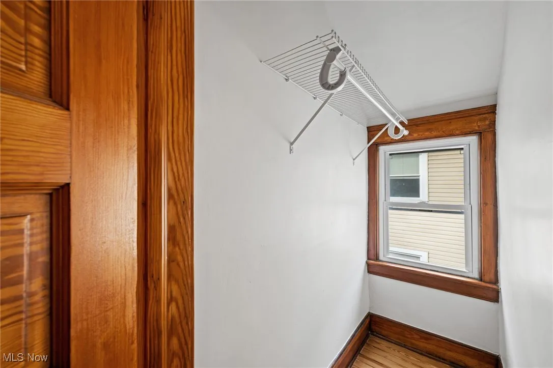 Spacious closet with wood finished floors