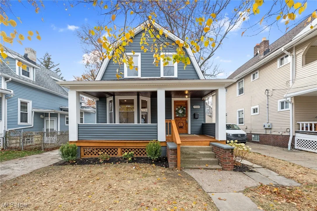 Colonial with a porch and a gambrel roof