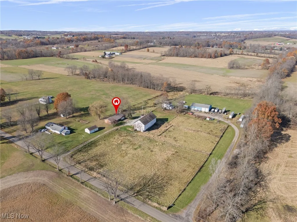 Aerial view of property's location with rural landscape