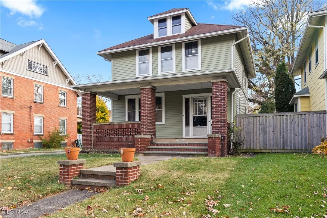Traditional style home with a porch
