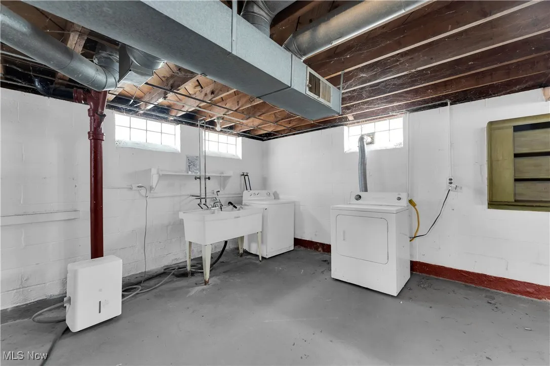 Basement with plenty of natural light and washer and dryer