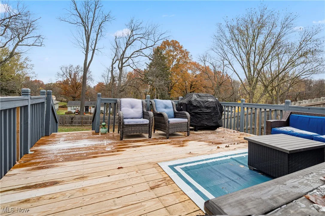 Wooden terrace with an outdoor hangout area