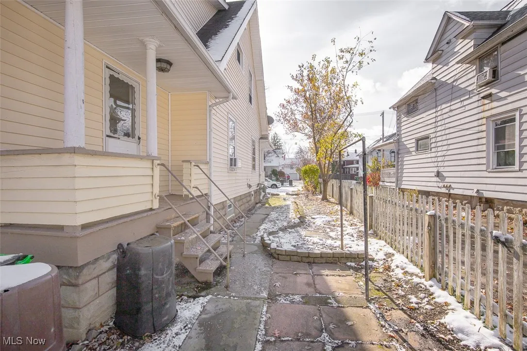 Down Unit private entrance to right when facing rear of home.