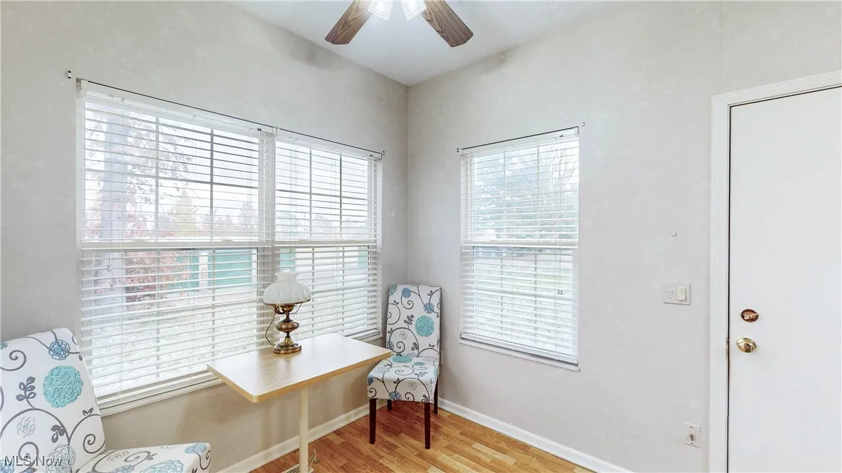 Additional view of sitting area/casual dining area of Kitchen w/door for access to attached garage