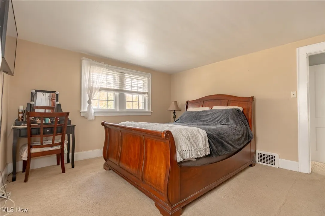 Master bedroom with carpet.