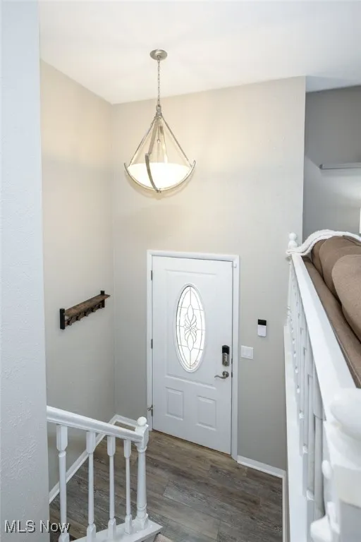 Foyer featuring LVT flooring