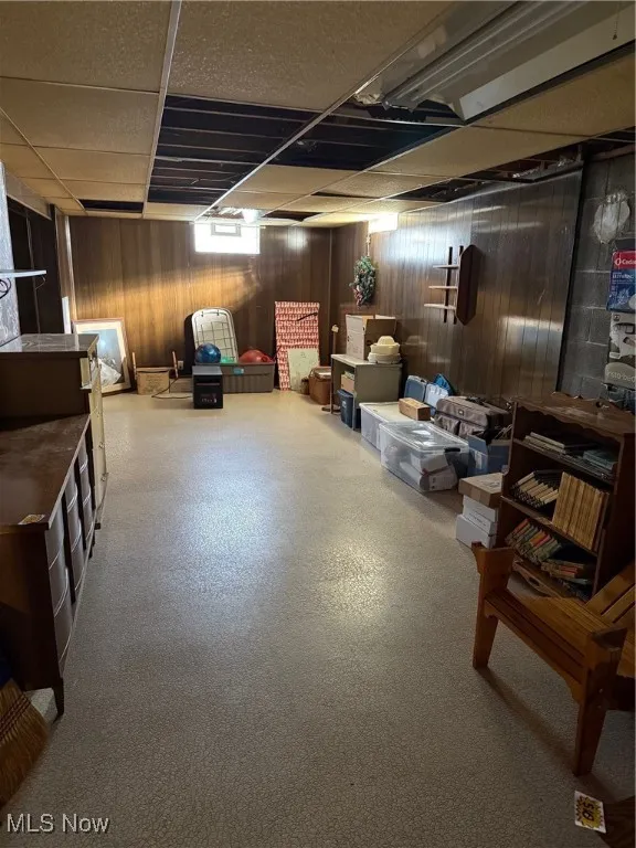 Below grade area with wood walls