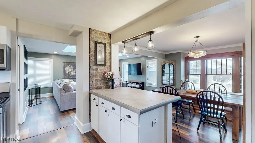 Kitchen is open to the dining room and family room. Bar counter seating offers additional dining space. Great open floor plan for entertaining!