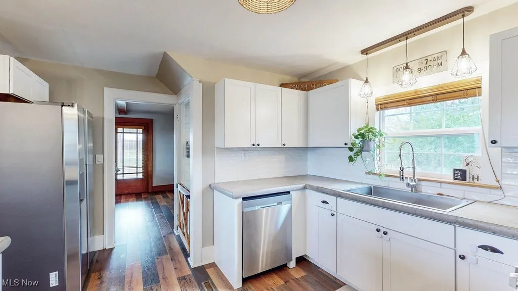 View from the kitchen to the front entry way! You will love the layout of this home!