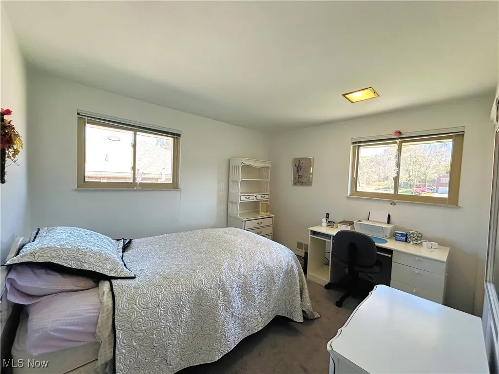 Bedroom featuring carpet
