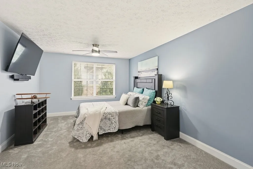 Master Bedroom with Walk-in Closet, Dual Sinks, and Large Garden Tub