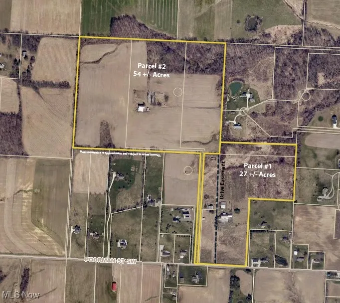 Aerial overview of property's location featuring property parcel outlined