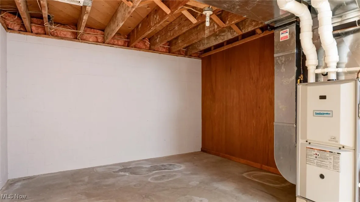 Below grade area with heating unit