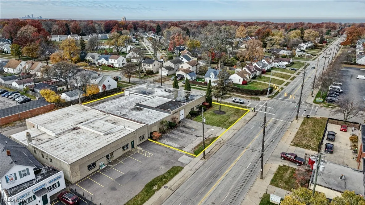 Aerial perspective of suburban area with property parcel outlined
