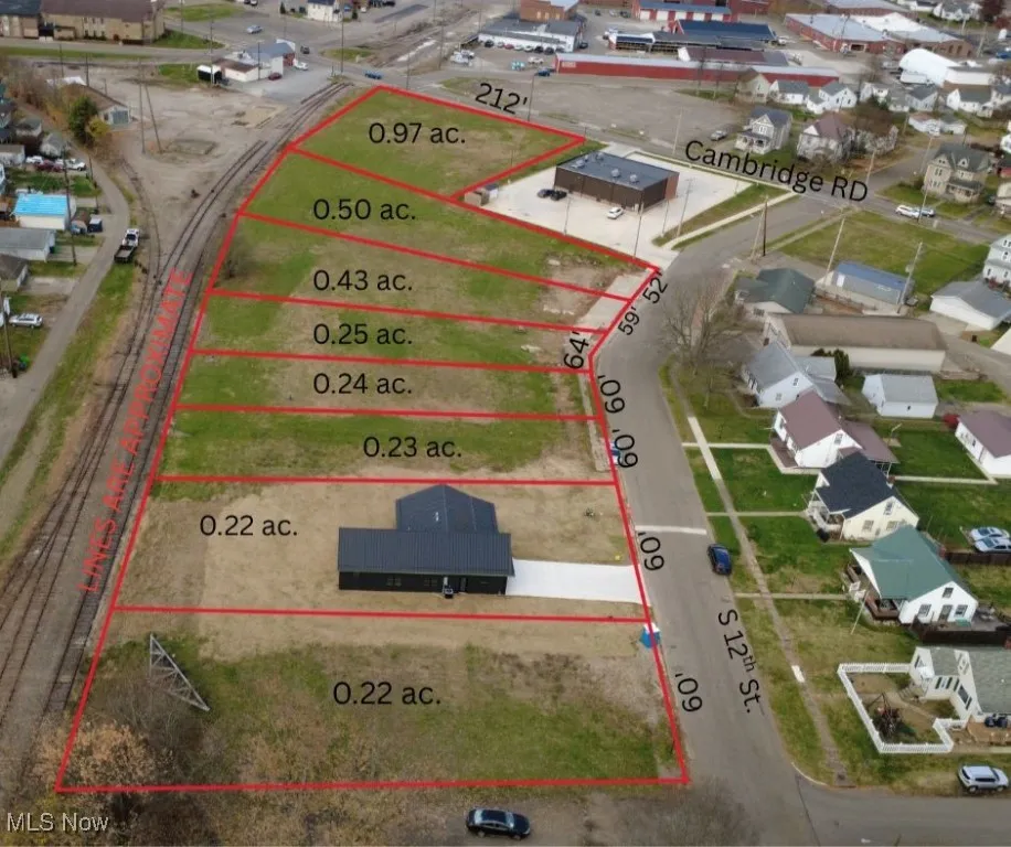 Aerial view of property's location featuring property parcel outlined