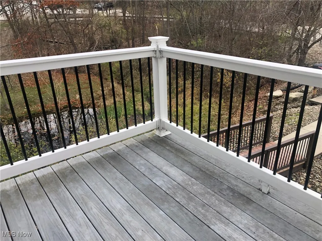 side view from balcony towards pond