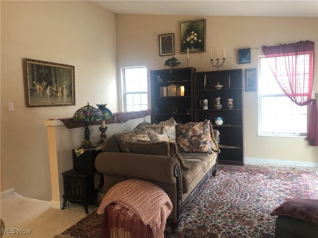 Living room with plenty of natural light and carpet