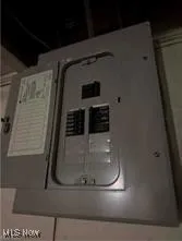 Utility room with electric panel