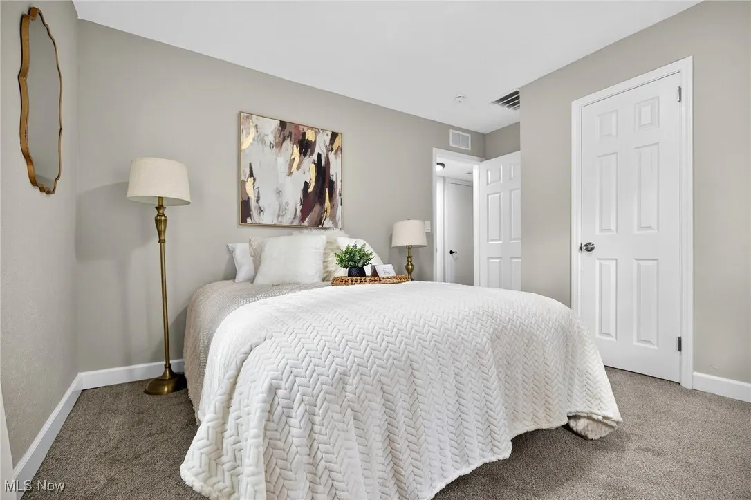 Bedroom featuring carpet flooring