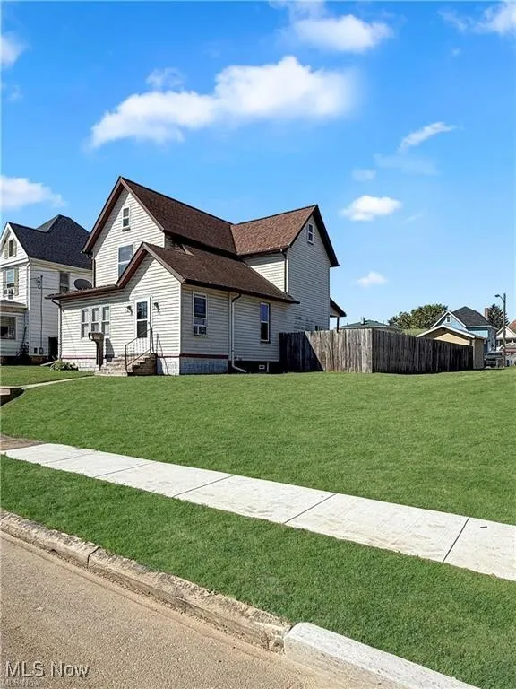 View of property exterior with entry steps
