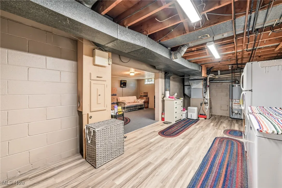  Utility Room with laundry shoot and extra fridge and stove