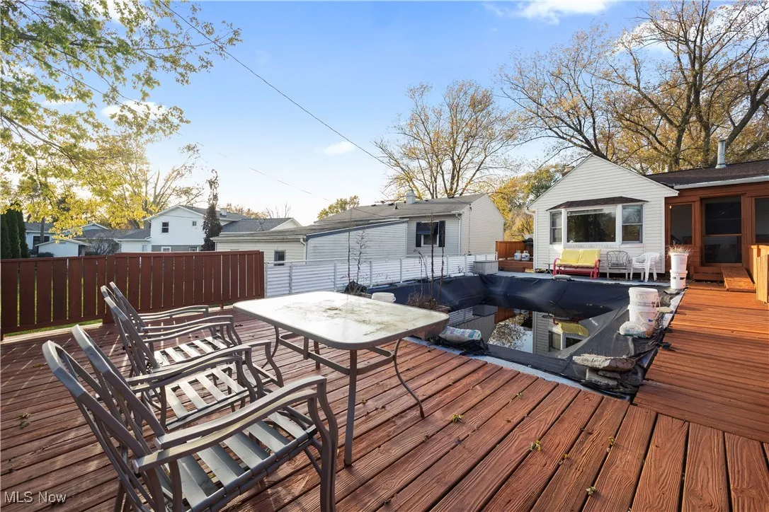 Wooden deck with outdoor dining area