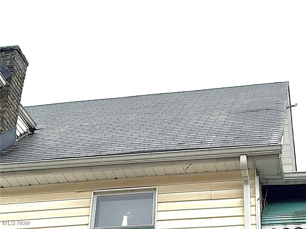 Exterior view of roof with shingles