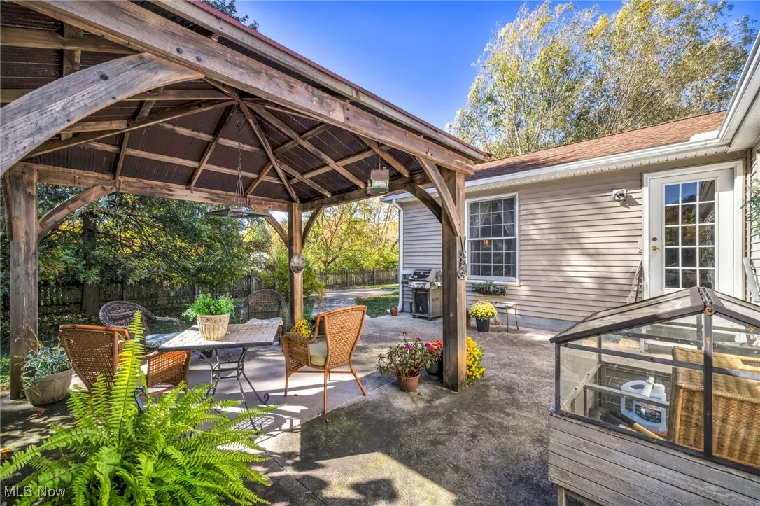 View of patio / terrace featuring a grill and a gazebo