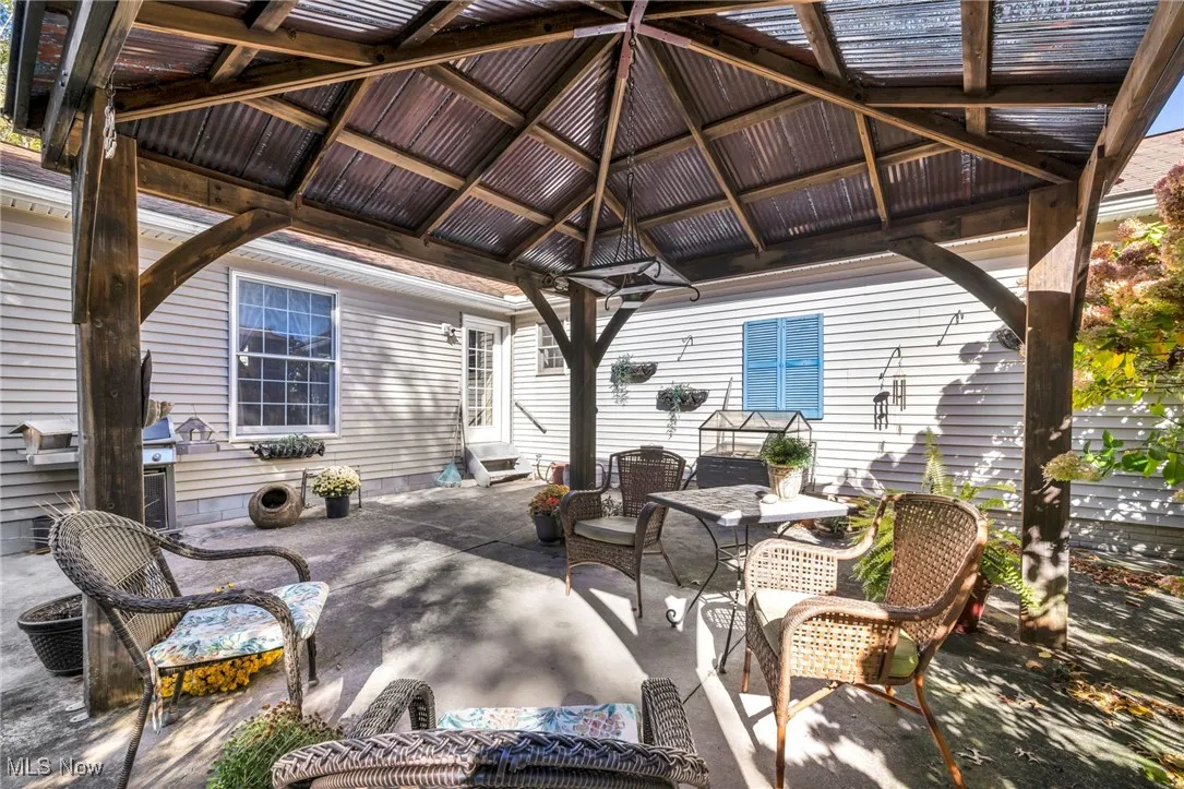 View of patio featuring a gazebo
