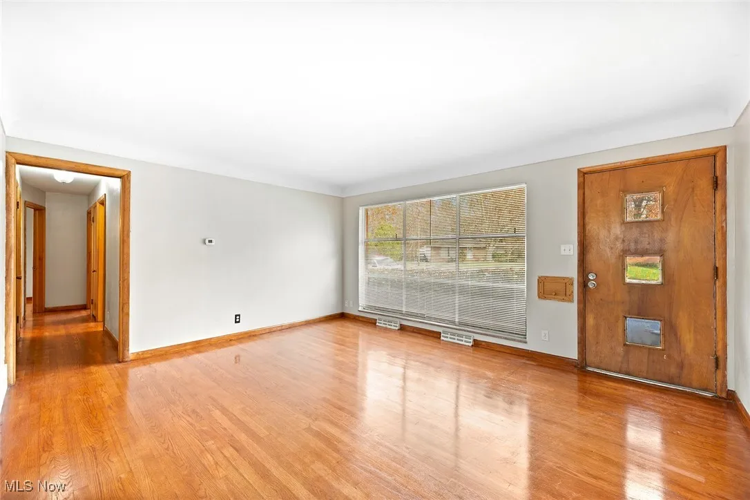Living room with light wood finished floors