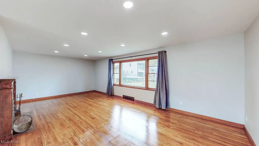 Living room featuring recessed lighting and light wood finished floors