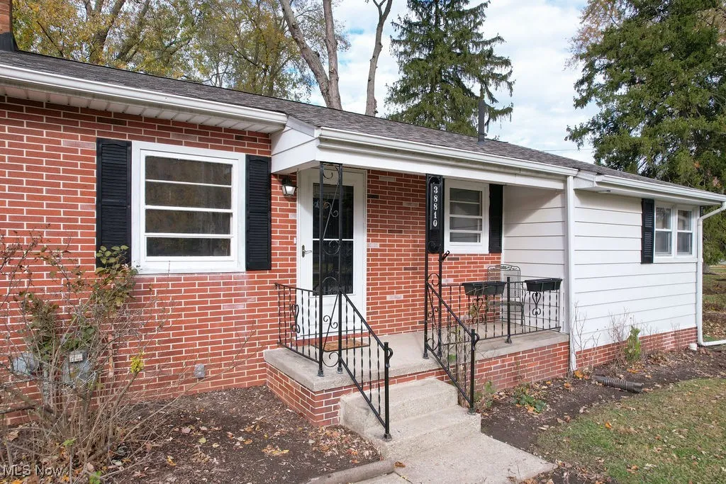 View of front of home with brick siding